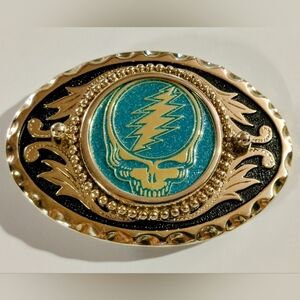 Grateful Dead "Rain" STEAL YOUR FACE Stealie Gold Tone Belt Buckle 3.25x2.25"